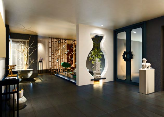 Interior space featuring decorative elements, including a sculpture and a water feature.