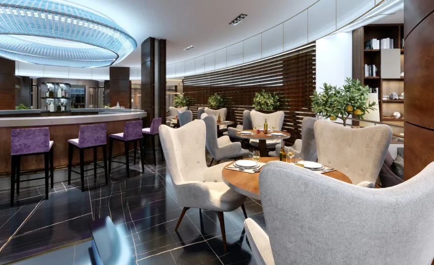 Contemporary restaurant interior featuring a stylish bar, elegant seating, and modern decor elements, ideal for dining experiences.
