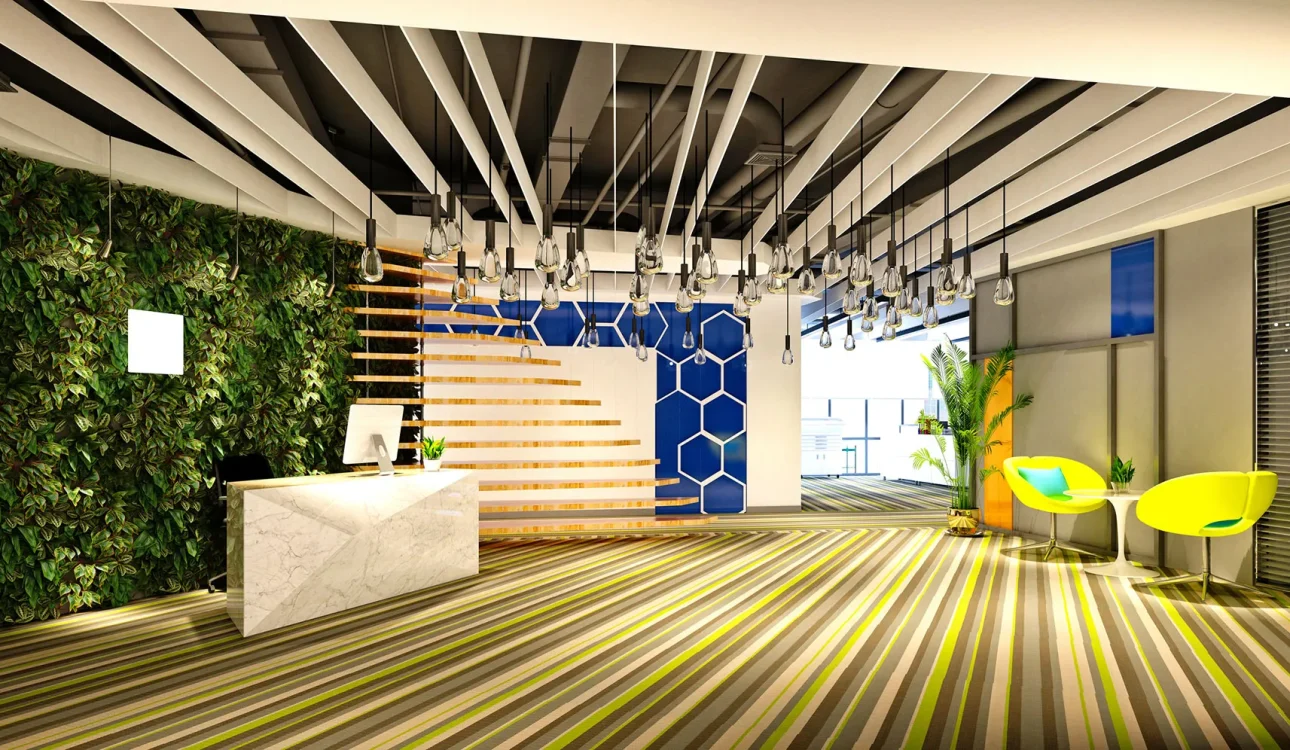 Interior view of a modern office reception area with green wall and unique lighting.