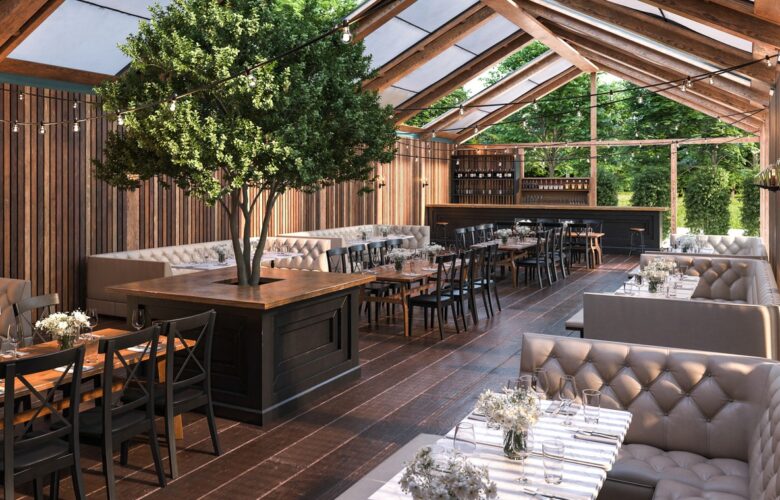 Interior view of a restaurant featuring wooden beams, seating areas, and a central tree.