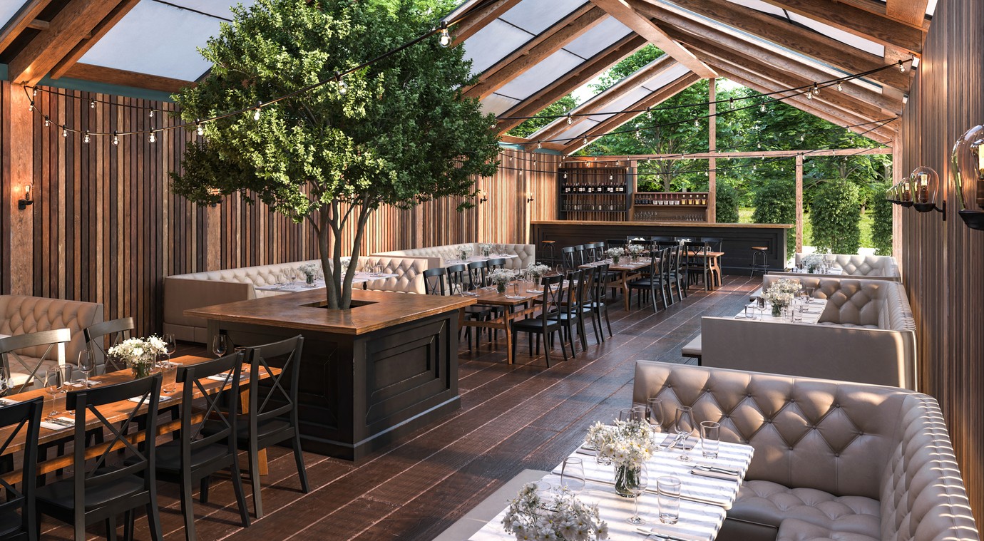 Interior view of a restaurant featuring wooden beams, seating areas, and a central tree.