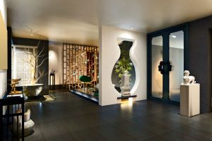 Interior space featuring decorative elements, including a sculpture and a water feature.