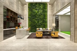 Faux green wall featuring various plants in a hotel reception lobby setting.