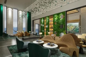 Lobby featuring a green wall with mirrors and modern furniture arrangements.